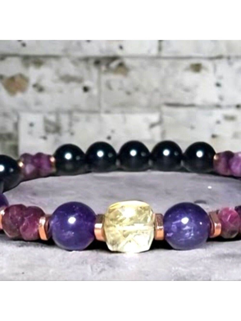 Handmade Amethyst and black Garnet bracelet, about 6.5 to 7.75 diameter.Elegant